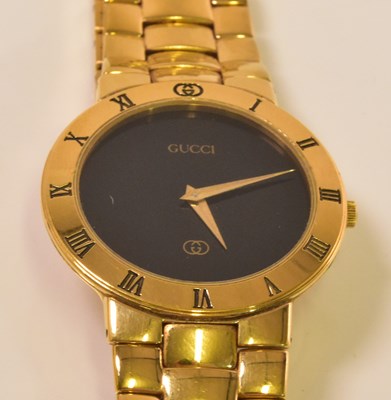 Lot 1327 - GUCCI; a gentleman's gold plated vintage...