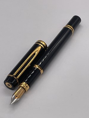 Lot 71 - WATERMAN; a vintage black bodied fountain pen...