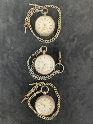 Lot 1346 - Three silver key wind open face pocket watches,...