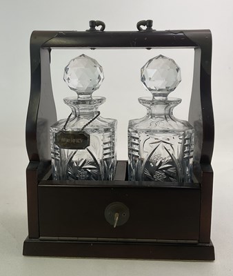 Lot 263 - A two bottle tantalus, together with a...