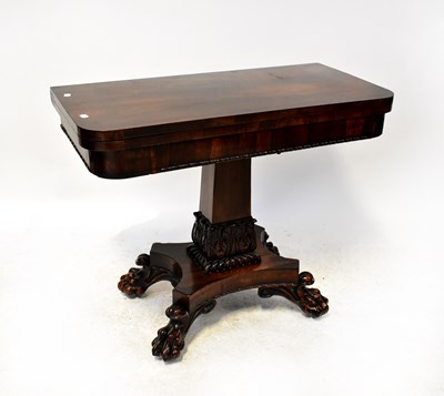 Lot 42 - A Victorian rosewood fold-over table