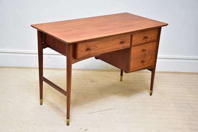 Lot 15 - A mid century teak desk, with an arrangement...