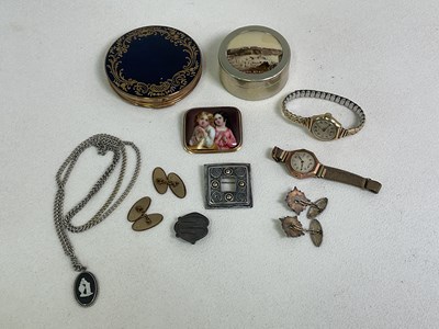 Lot 1058 - A small group of costume jewellery including...