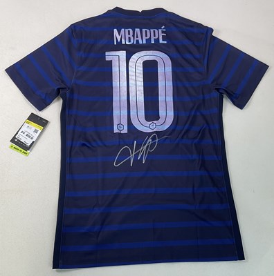 Lot 1961 - KYLIAN MBAPPÉ; a replica France shirt signed...