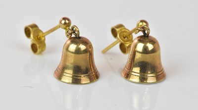 Lot 1303 - A pair of 9ct yellow gold earrings modelled as...