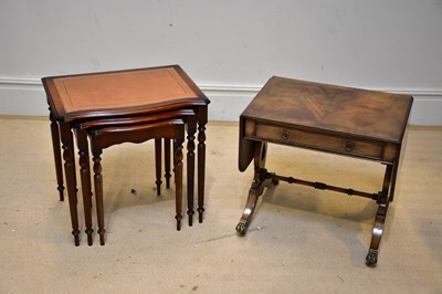 Lot 76 - A reproduction nest of three occasional tables...