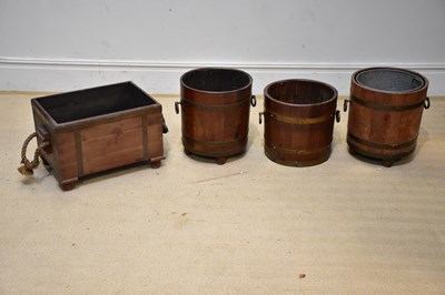 Lot 263 - A pair of brass bound teak circular planters...