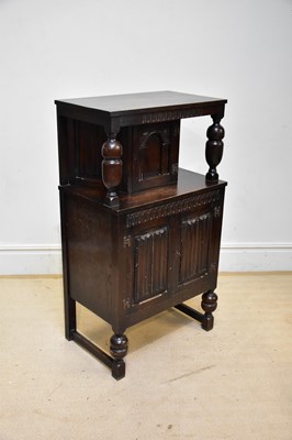 Lot 74 - A modern oak court cupboard of small...