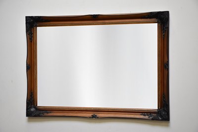 Lot 75 - A modern rectangular wall mirror, with...