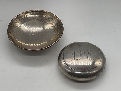 Lot 1496 - A E JONES; an Arts and Crafts small hammered...