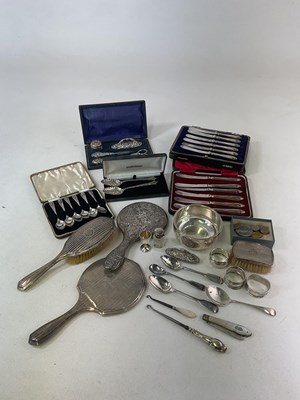 Lot 1454 - A group of silver including an Edwardian cased...