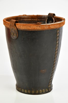 Lot 310 - A 19th century leather and studded fire bucket...