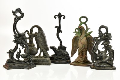 Lot 550 - Five Victorian and later cast iron doorstops...