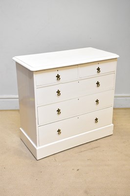 Lot 167 - A white painted Victorian pine chest of two...