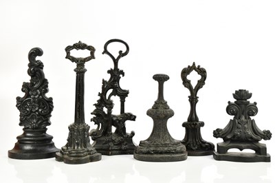 Lot 522 - Six Victorian and later cast iron doorstops...