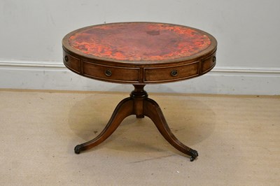 Lot 61 - A reproduction mahogany drum table, with...