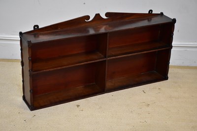 Lot 183 - A 19th century mahogany wall shelf, with...