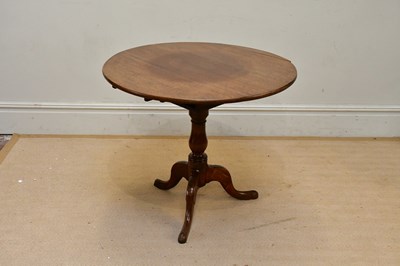 Lot 171 - A Georgian oak tilt-top tripod table with...