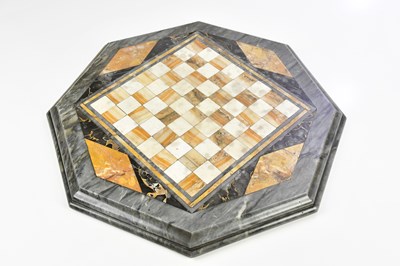 Lot 334 - An Art Deco style marble octagonal chessboard,...