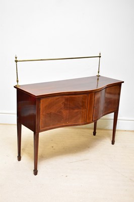 Lot 126 - A Georgian inlaid mahogany serpentine fronted...