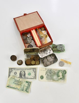 Lot 605 - An assortment of coins and bank notes,...