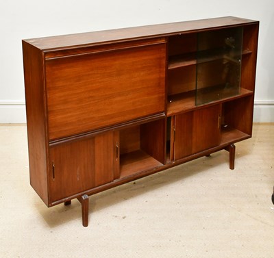 Lot 17 - A mid century teak bookcase with pull-down...