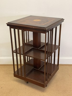 Lot 877 - A reproduction mahogany and inlaid revolving...