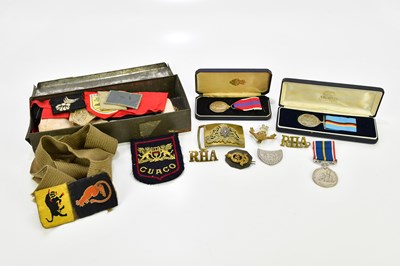 Lot 1296 - A collection of military badges and patches...