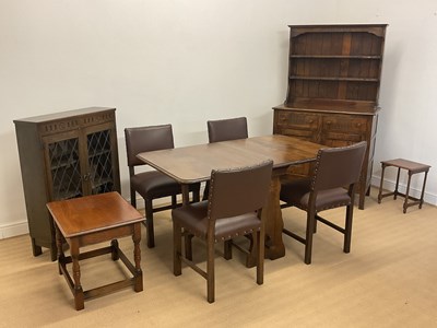 Lot 786 - A suite of oak furniture comprising drop-leaf...