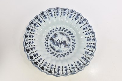 Lot 769 - A German blue and white faience ware bowl,...