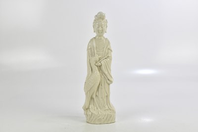 Lot 879 - A Chinese Blanc de Chine figure of Guanyin...