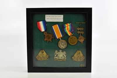 Lot 1297 - A collection of medals and cap badges awarded...