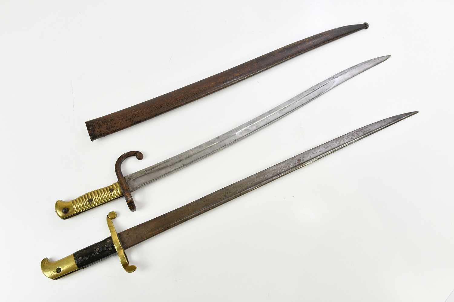Lot 1352 - A French 1866 chassepot bayonet with scabbard...
