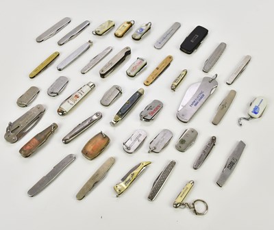 Lot 429 - A collection of advertising penknives...