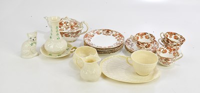 Lot 778 - BELLEEK; a small collection of ceramics and an...