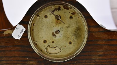 Lot 707 - An early 20th century oak Napolean hat shaped...