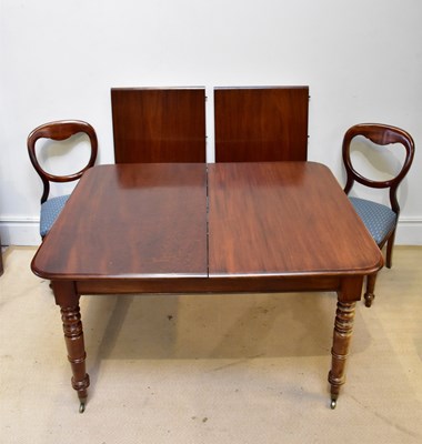 Lot 130 - A Victorian mahogany extending table on turned...