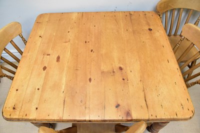 Lot 98 - A rustic pine table with turned legs, height...