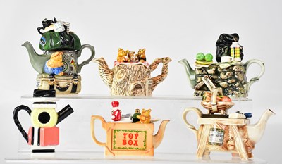 Lot 483 - PAUL CARDEW; six novelty one-cup teapots,...