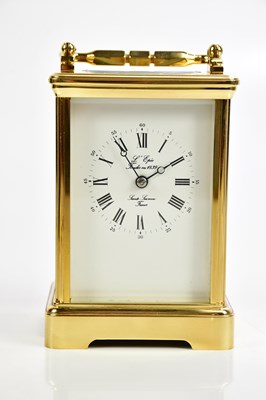 Lot 708 - L'EPEE; a modern brass carriage clock, height...