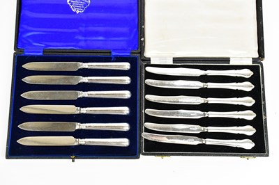 Lot 577 - A cased set of silver handled tea knives and...