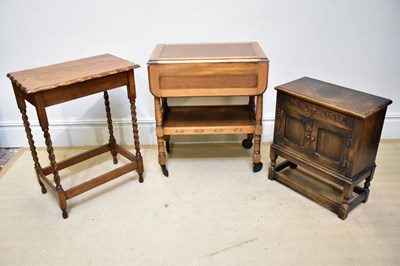 Lot 80 - A reproduction oak trolley, 76 x 65 x 42cm, a...