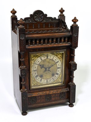 Lot 2626 - A late 19th century German oak cased mantel...