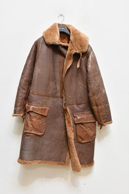 Lot 1239 - An RAF leather and sheep skin long coat.