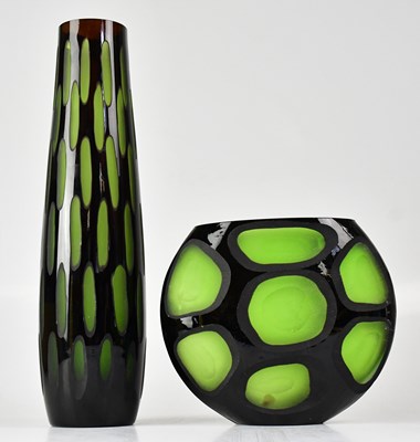 Lot 539 - A tall green and black glass vase, height 40cm,...