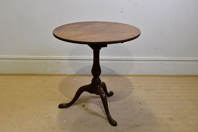 Lot 245 - A 19th century mahogany tilt-top tripod table...