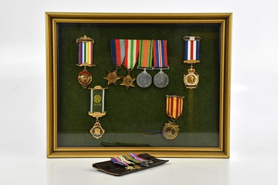 Lot 214 - A framed collection of WWII medals including...