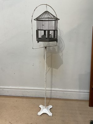 Lot 273 - GENYKAGE; a bird cage on stand, height 168cm.