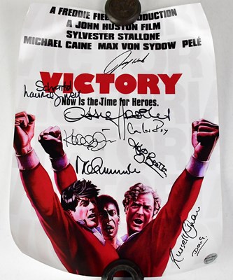 Lot 331 - ESCAPE TO VICTORY; a replica poster for the...