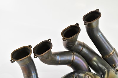 Lot 1050 - FORMULA ONE (F1) INTEREST; part of an exhaust...